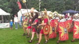 Roman Reenactment at the Amphitheatre in Caerleon Marching In [upl. by Bluefield809]